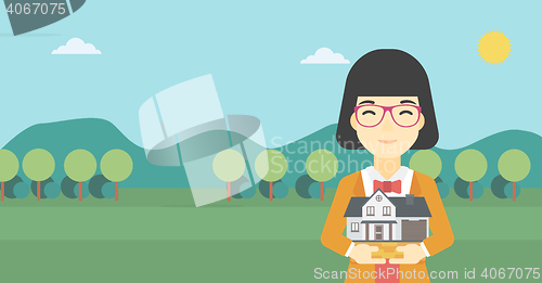 Image of Woman holding house model vector illustration.