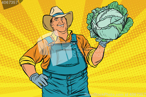 Image of Rural retro farmer and a head of green cabbage