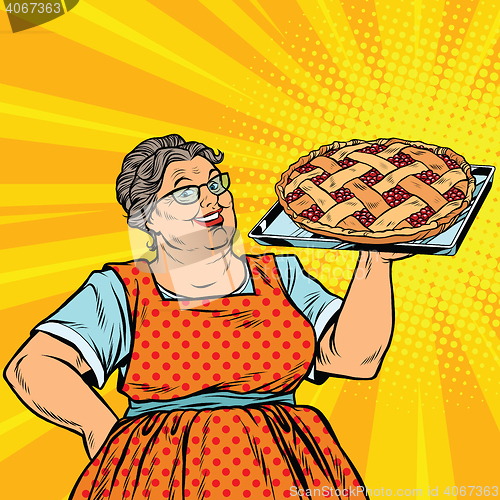 Image of Old joyful retro woman with berry pie