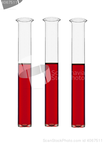 Image of three  test-tubes with red liquid