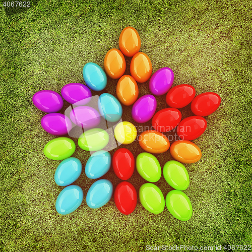 Image of Colored Easter eggs as a flower on a green grass. 3D illustratio