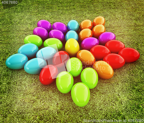 Image of Colored Easter eggs as a flower on a green grass. 3D illustratio