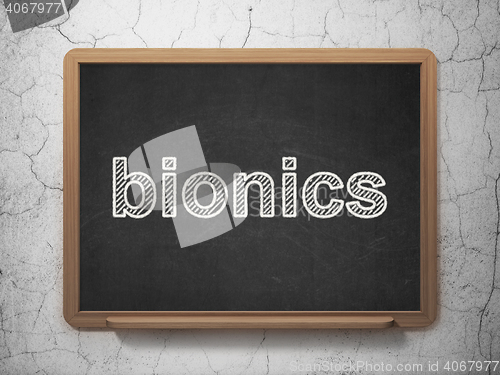 Image of Science concept: Bionics on chalkboard background