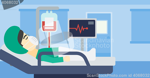 Image of Patient lying in hospital bed with heart monitor.