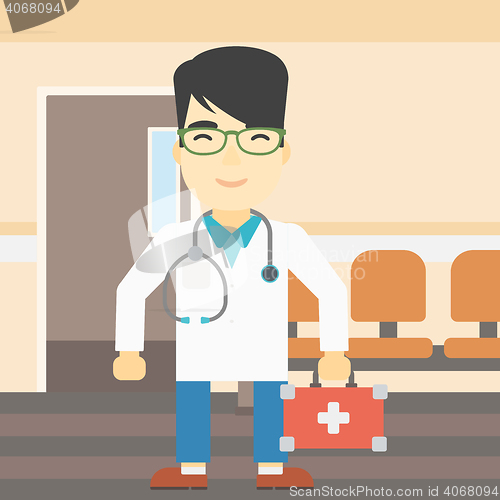 Image of Doctor with first aid box vector illustration.