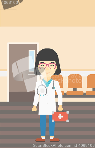 Image of Doctor with first aid box vector illustration.
