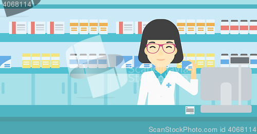 Image of Pharmacist showing some medicine.