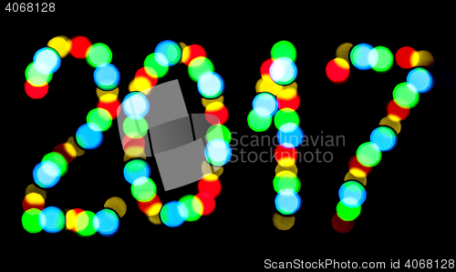 Image of Happy New Year 2017 written blurred lights