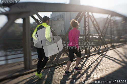 Image of young  couple jogging