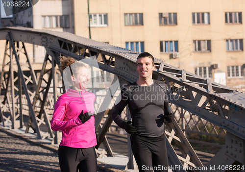 Image of young  couple jogging