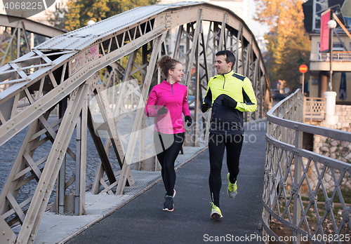 Image of young  couple jogging