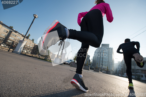 Image of young  couple jogging