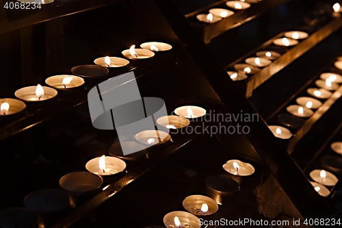 Image of Candles in a dark church