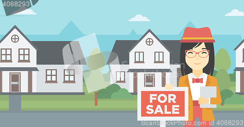Image of Real estate agent offering house.
