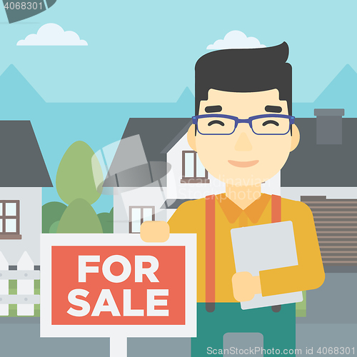 Image of Real estate agent offering house.