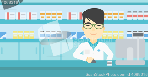 Image of Pharmacist at counter with cash box.