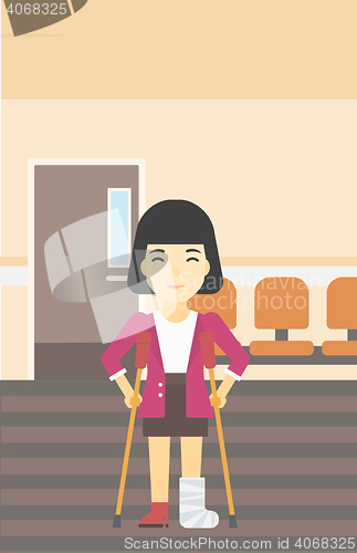Image of Woman with broken leg and crutches.
