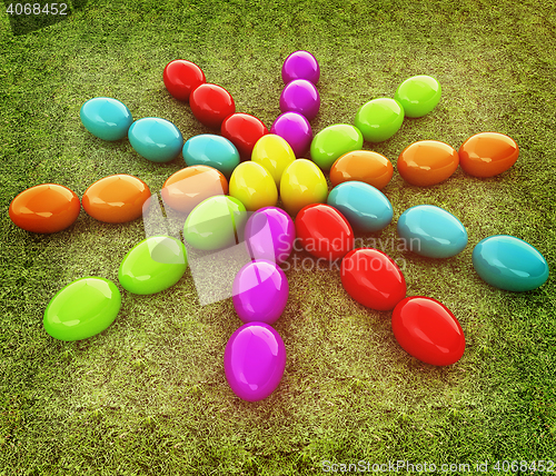Image of Colored Easter eggs as a flower on a green grass. 3D illustratio