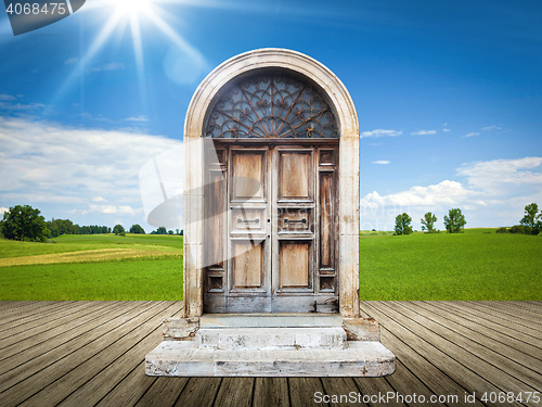 Image of landscape with an old door