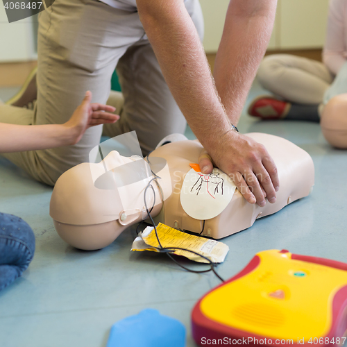 Image of First aid resuscitation course using AED.