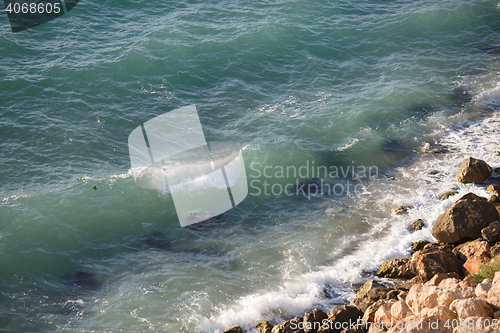 Image of Beautiful coastline with large rocks and clear sea