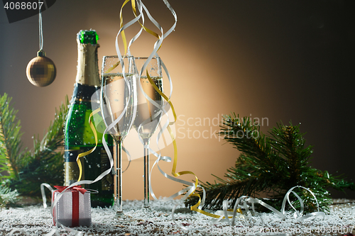 Image of Beautiful composition with champagne, gift box and Christmas decorations