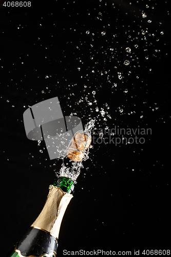 Image of Champagne explosion and bright fountain of spray