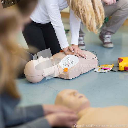 Image of First aid resuscitation course using AED.