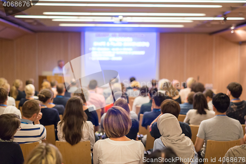 Image of Audience in lecture hall on scientific conference.