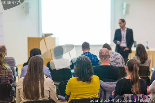 Image of Audience in lecture hall on scientific conference.