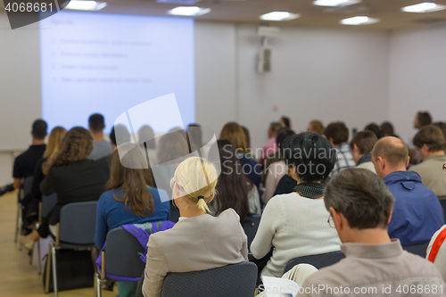 Image of Audience in lecture hall on scientific conference.