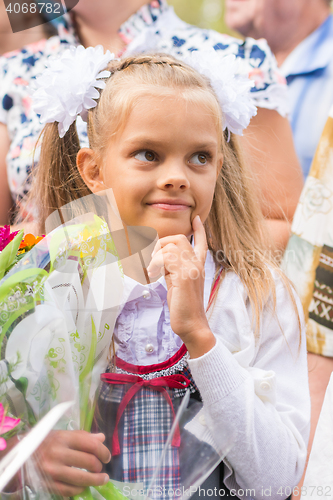 Image of First grader on the first line of thought happily September