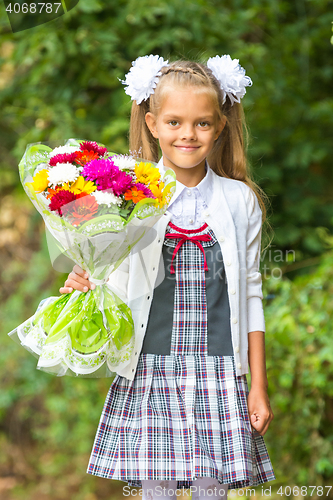 Image of Portrait of a seven-year first-grade girls going to school on September 1 in