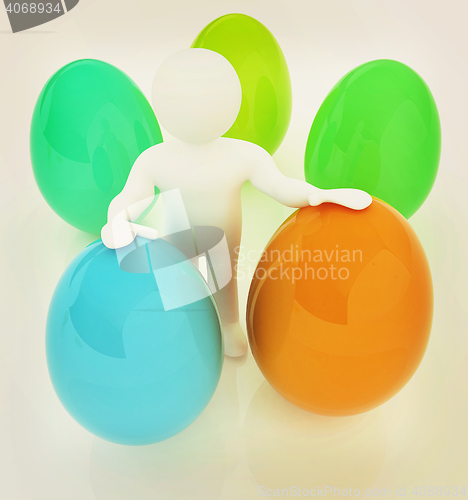 Image of 3d small person holds the big Easter egg in a hand. 3d image.. 3