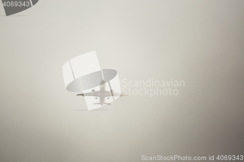Image of Airplane in thick fog