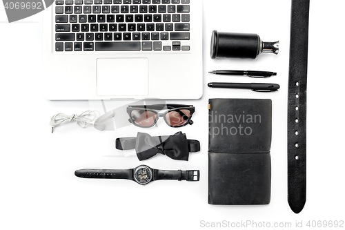 Image of Still life of casual man. Modern male accessories and laptop on white