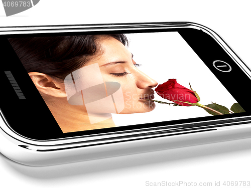 Image of Mobile Phone Photo Of Girlfriend With A Red Rose