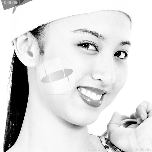 Image of Joyful Girl Smiling And Wearing A Christmas Hat