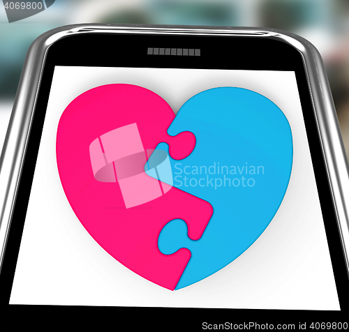 Image of Two-Pieced Heart On Smartphone Showing Complement