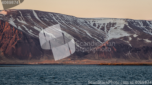 Image of Small settlement under mountains