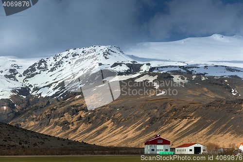 Image of Farm house near mountain