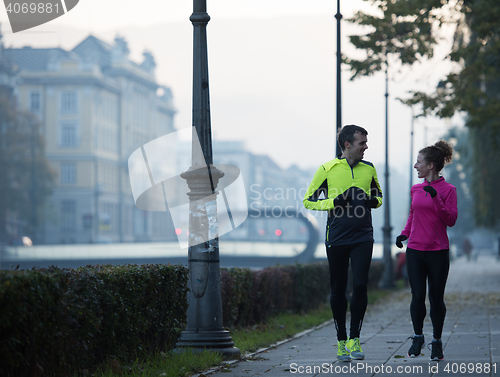 Image of young  couple jogging