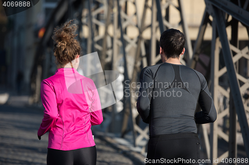 Image of young  couple jogging