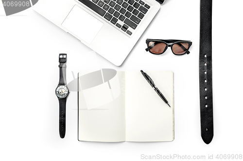 Image of Still life of casual man. Modern male accessories and laptop on white