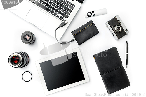 Image of Workplace of business. Modern male accessories and laptop on white