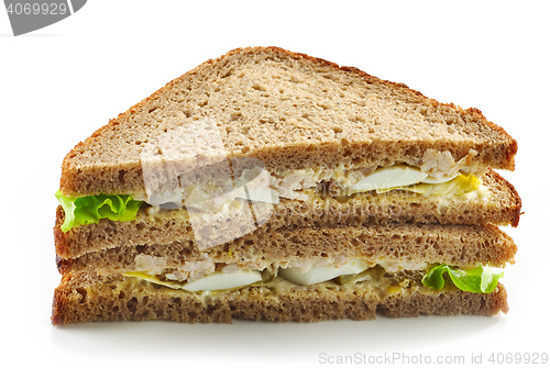 Image of Rye bread sandwich with chicken and egg