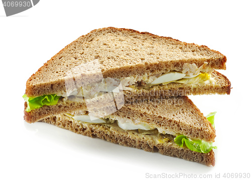 Image of Rye bread sandwich with chicken and egg