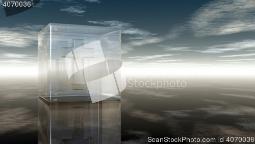 Image of christian cross in glass cube under cloudy sky - 3d rendering