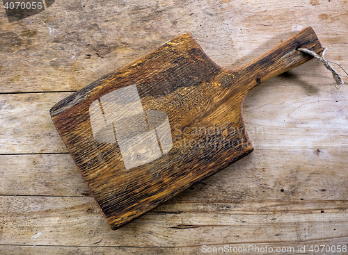 Image of cutting board on wooden table