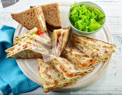 Image of various triangle sandwiches